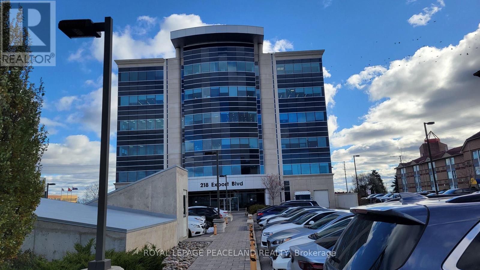 407 - 218 Export Boulevard, Mississauga, Ontario  L5S 1Y4 - Photo 2 - W12556806