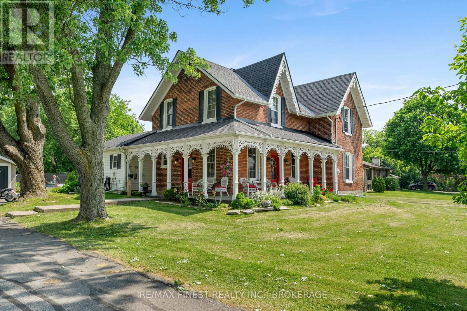 Welcome to 7407 County Road 2 in Napanee, Ontario! Step into timeless elegance with this beautifully restored red brick Victorian, perfectly blending historic charm with modern luxury. Fully updated from top to bottom, this exceptional home features original architectural details, and contemporary finishes throughout. The 3 bedrooms have been tastefully updated and the 3 bathrooms include a claw foot tub, a fabulous ensuite and the convenience of a main level washroom with laundry included. The chef's kitchen complete with recently installed top of the line appliances including brand new fridge (June 2025), creates a gorgeous french farmhouse style space which provides an amazing place to sit, chat, cook and sip your favourite beverage. Take a walk around the beautiful wrap-around porch to the outdoor oasis where you will discover the recently installed patio designed for entertaining, complete with a sparkling saltwater in-ground pool that invites relaxation and summer gatherings as well as a state of the art Arctic Spa hot tub. Back inside, enjoy light filled living spaces, sleek modern updates, spa inspired bathrooms, and thoughtfully updated HVAC and Septic systems for comfort and peace of mind. With a 3 year old roof, new windows and doors, this home is sure to impress as well asset your mind at ease that all the heavy lifting has been done. This rare gem combines character, sophistication, and resort-style living. A must see for those seeking history with high end comfort. A massive list of inclusions including the pizza oven, loads of furniture list available on request. List of renovations sent on request. (id:48254)