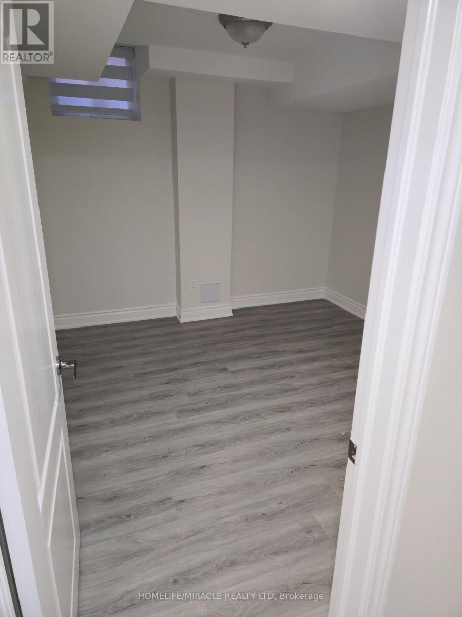 Basement Apartment - 23 Elverton Crescent, Brampton, Ontario  L7A 4Z4 - Photo 6 - W12557040