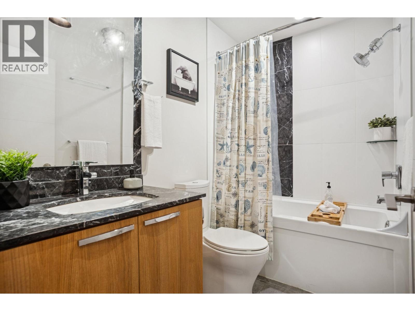 303 733 W 14 Street, North Vancouver, British Columbia  V7M 0C6 - Photo 19 - R3068593