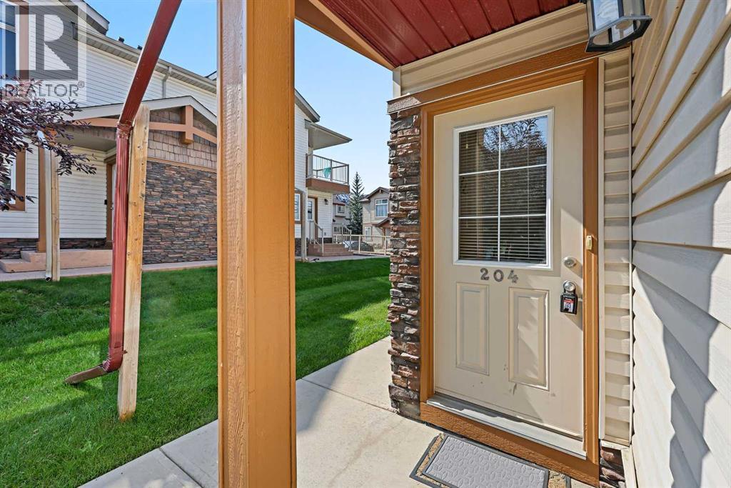 204, 30 Panatella Landing Nw, Calgary, Alberta  T3K 0K8 - Photo 3 - A2256467