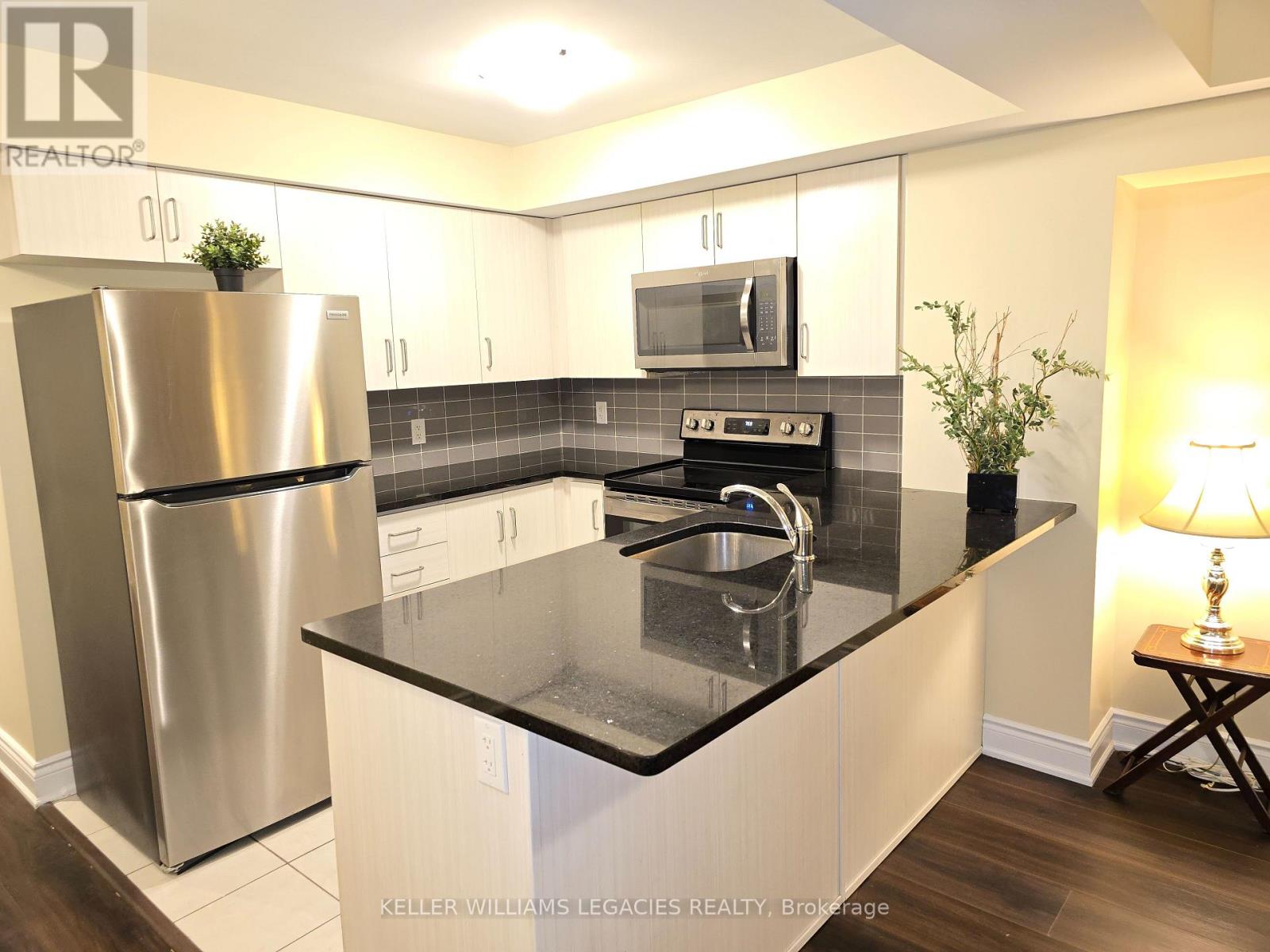 107 - 7 Applewood Lane, Toronto, Ontario  M9C 2Z7 - Photo 6 - W12557356