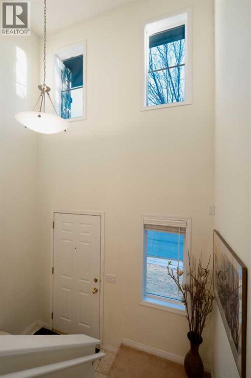 24 Hidden Creek Rise Nw, Calgary, Alberta  T3A 6L5 - Photo 4 - A2269916