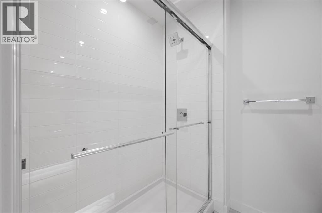 204, 8370 Broadcast Avenue Sw, Calgary, Alberta  T3H 6L3 - Photo 23 - A2258363