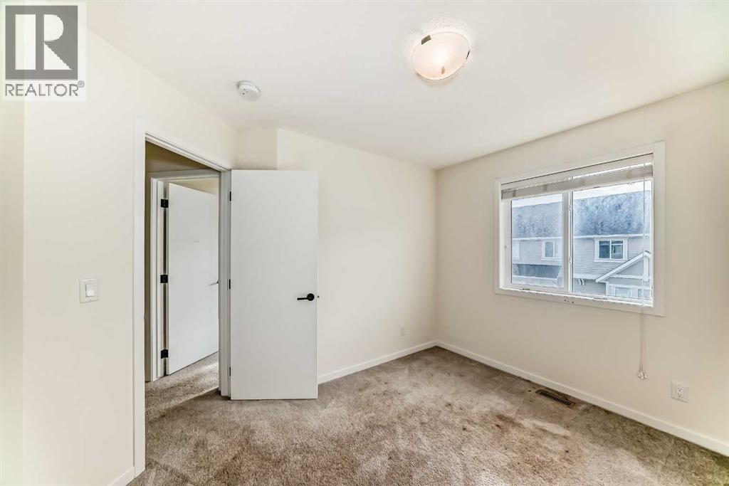 203 South Point Park Sw, Airdrie, Alberta  T4B 5G8 - Photo 30 - A2264535