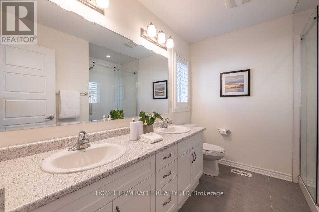 1229 Rose Way, Milton, Ontario  L9T 7E7 - Photo 22 - W12557452