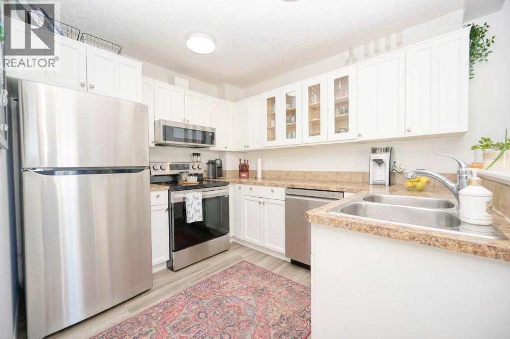 165 Bayside Point Sw, Airdrie, Alberta  T4B 2Z2 - Photo 8 - A2266703