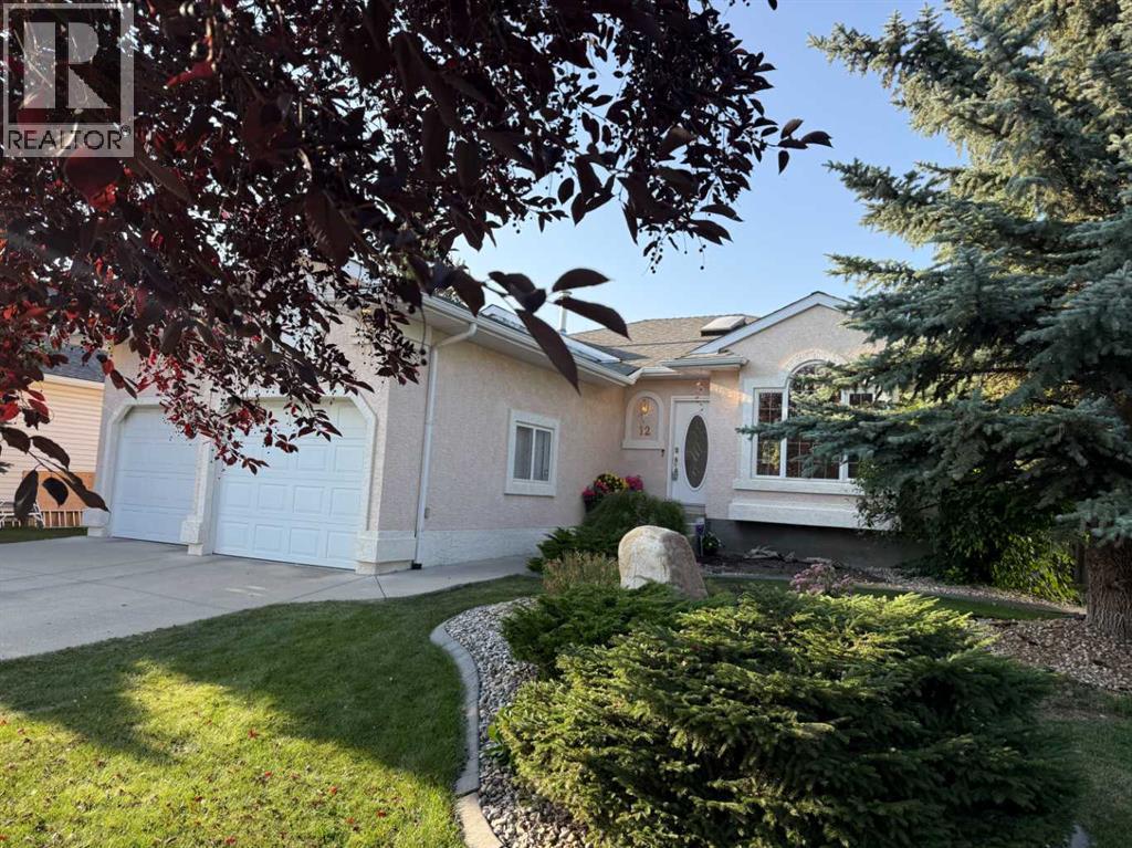 12 Bow Way, Cochrane, Alberta  T4C 1N4 - Photo 4 - A2258102