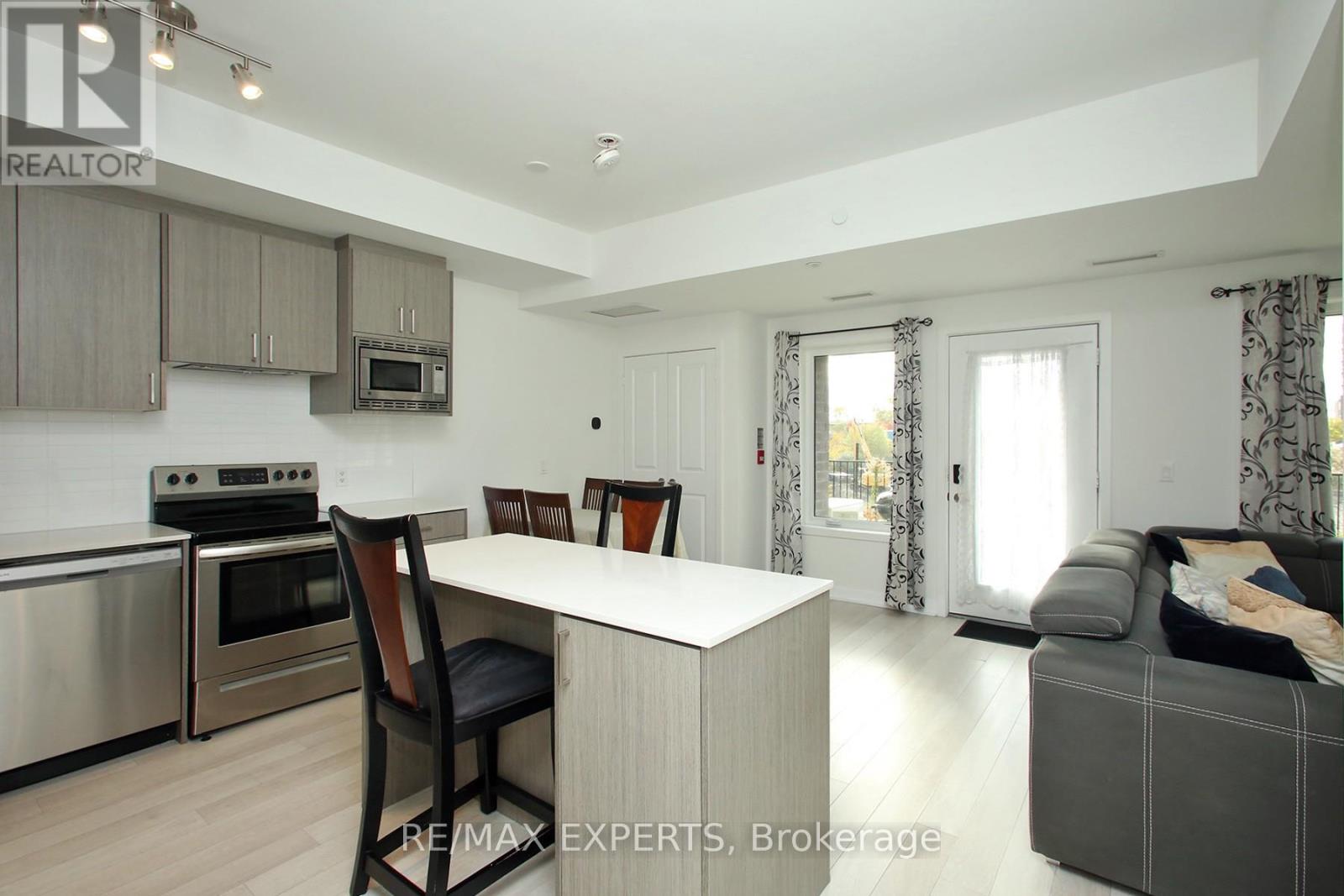 115 - 155 Downsview Park Boulevard, Toronto, Ontario  M3K 0E3 - Photo 10 - W12558332