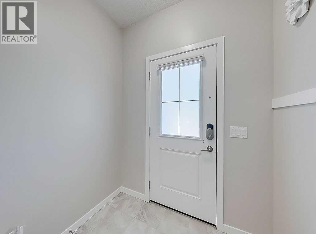 117 Nolancrest Common Nw, Calgary, Alberta  T3R 0Y1 - Photo 3 - A2261447