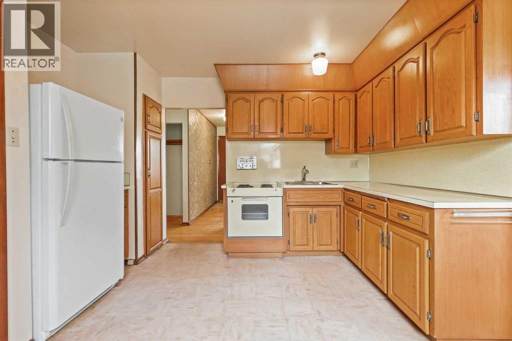 3504 Button Road Nw, Calgary, Alberta  T2L 1N1 - Photo 5 - A2269369