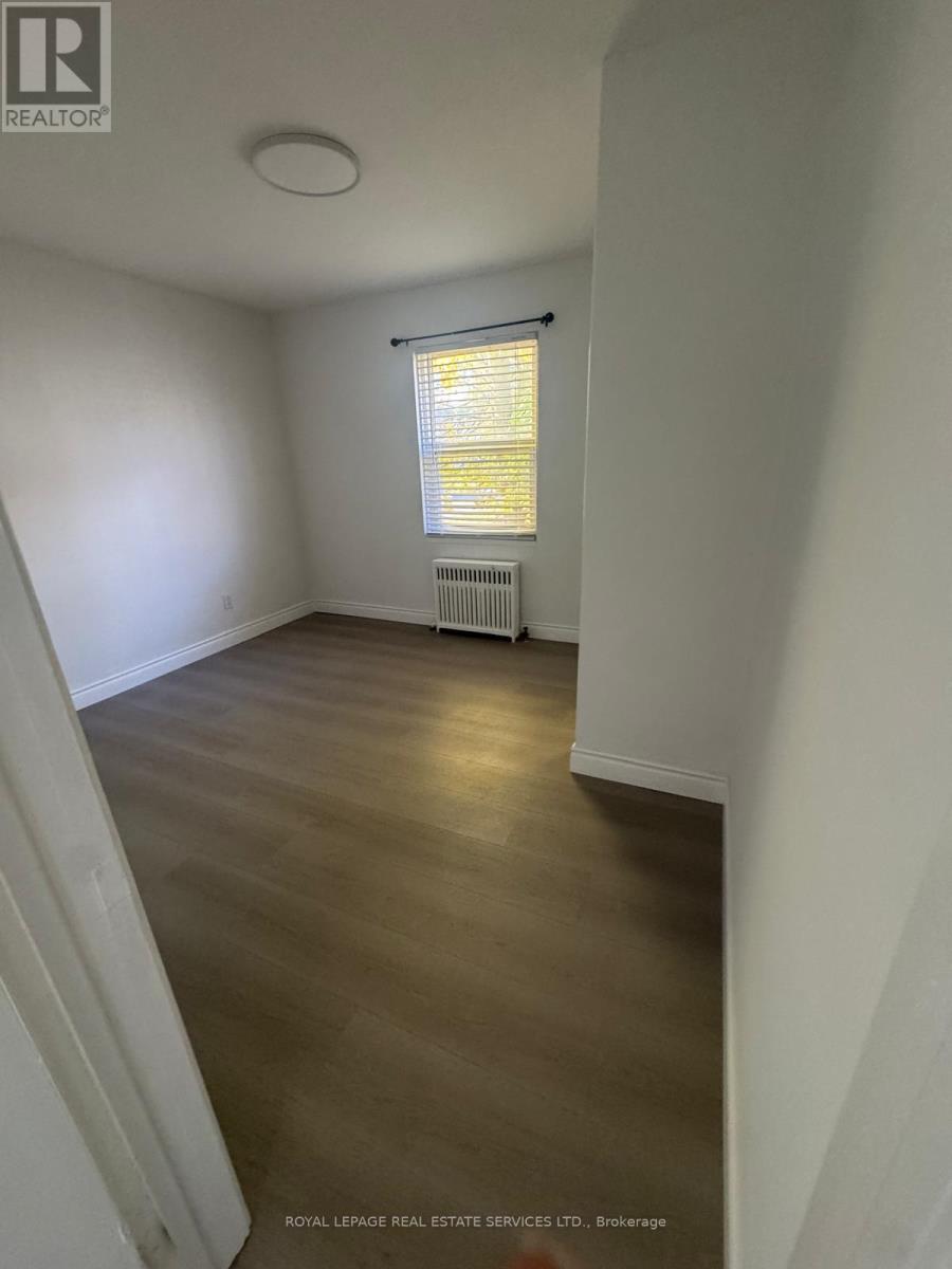 201 - 55a Long Branch Avenue W, Toronto, Ontario  M8W 3J1 - Photo 2 - W12558854