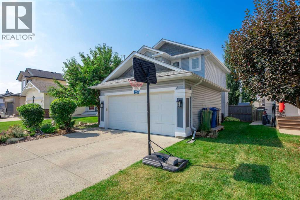 754 Cimarron Close, Okotoks, Alberta  T1S 1X4 - Photo 3 - A2264411