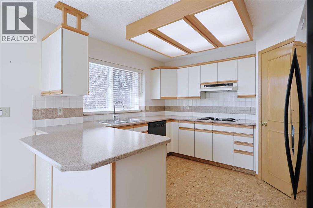 15 Hampshire Close Nw, Calgary, Alberta  T3A 4X9 - Photo 9 - A2252395