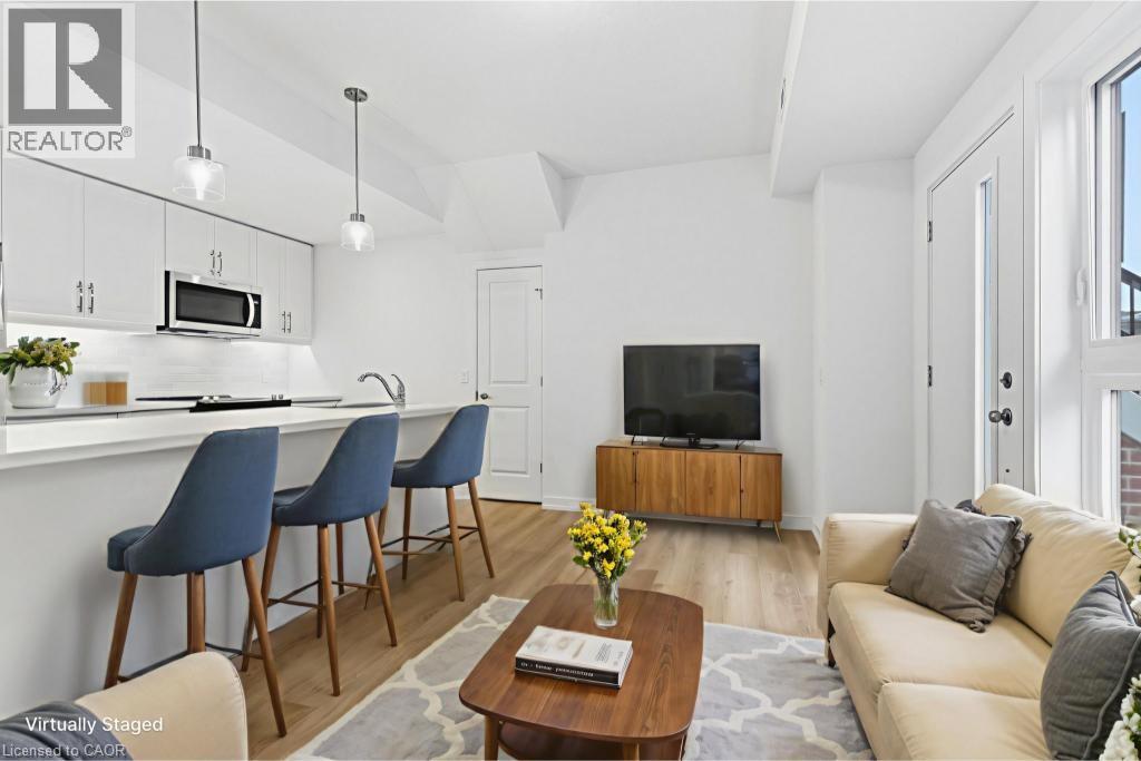 70 Kenesky Drive Unit# 29, Waterdown, Ontario  L8B 2A9 - Photo 4 - 40789110