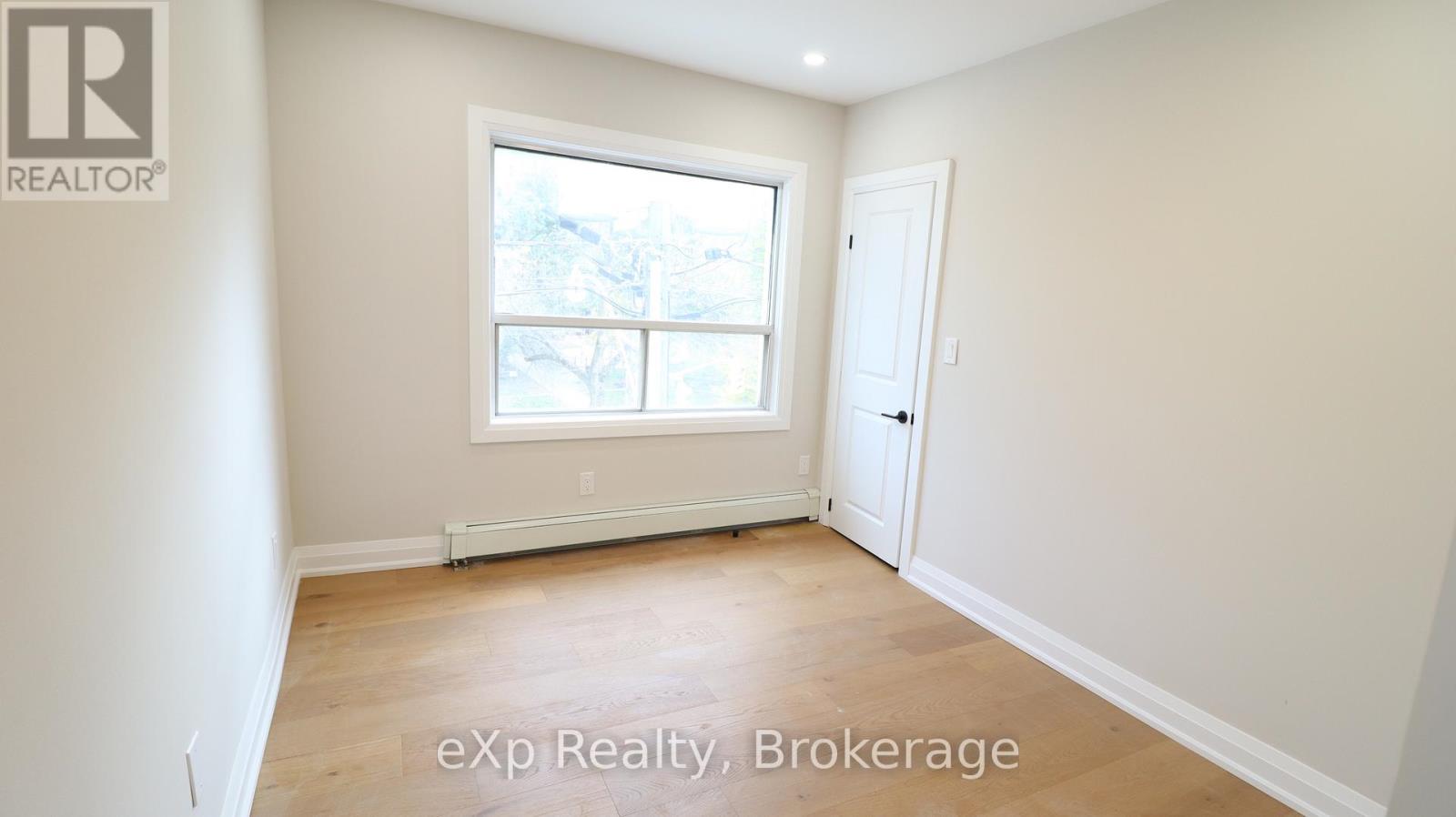 3 - 2002 Queen Street E, Toronto, Ontario  M4L 1J3 - Photo 11 - E12483716