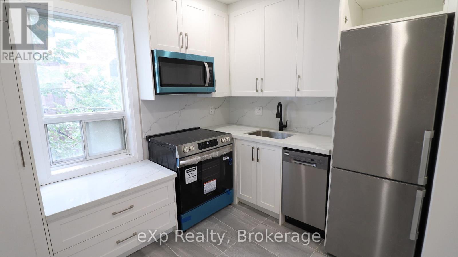 3 - 2002 Queen Street E, Toronto, Ontario  M4L 1J3 - Photo 8 - E12483716