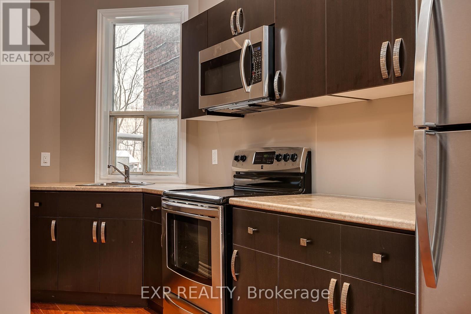 43 Springhurst Avenue, Toronto, Ontario  M6K 1B4 - Photo 4 - W12559696