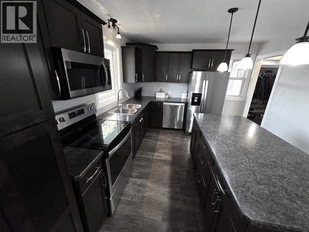 4920 55 Avenue, Taber, Alberta  T1g 1H4 - Photo 5 - A2270243