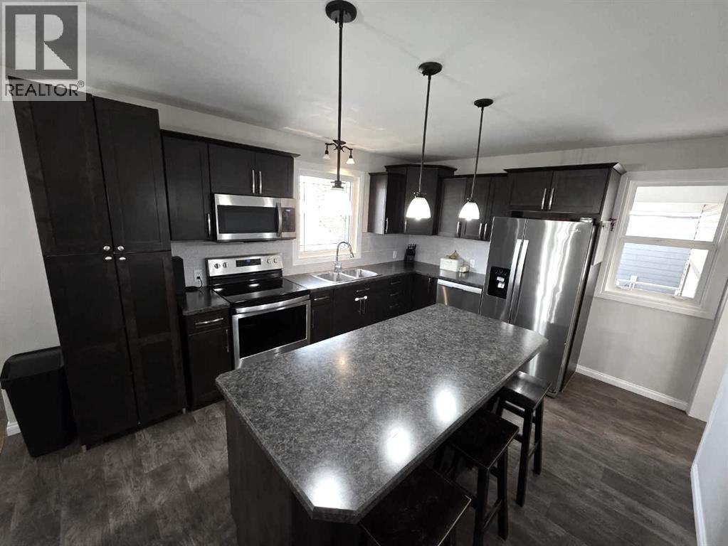 4920 55 Avenue, Taber, Alberta  T1g 1H4 - Photo 6 - A2270243