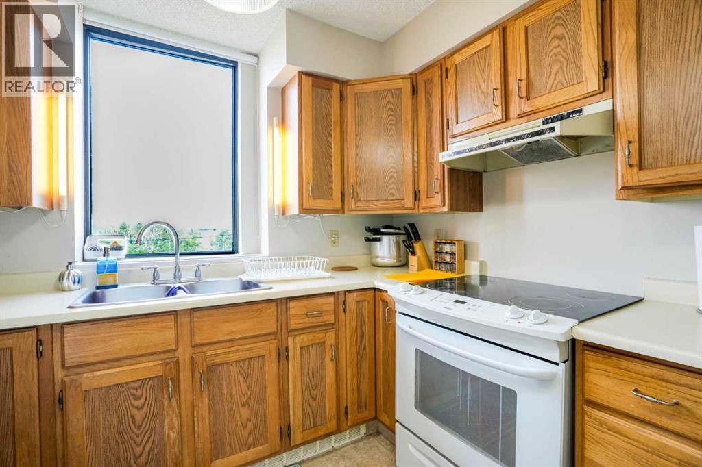 408, 80 Point Mckay Crescent Nw, Calgary, Alberta T3B 4W4 - Photo 4 - A2231326