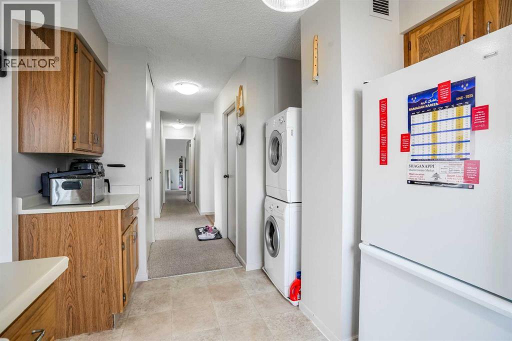 408, 80 Point Mckay Crescent Nw, Calgary, Alberta T3B 4W4 - Photo 7 - A2231326