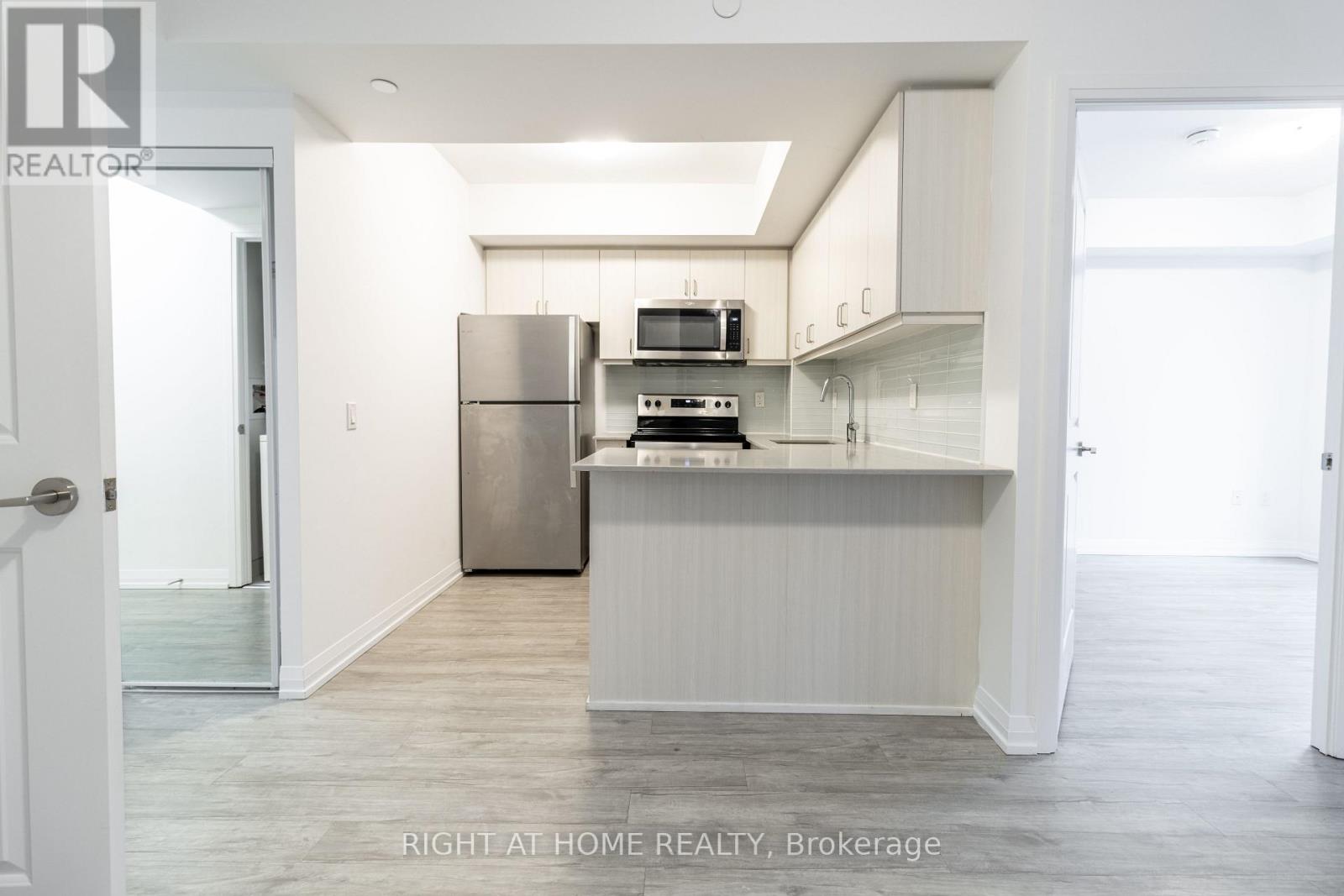 414 - 55 Smooth Rose Court, Toronto, Ontario  M2J 0G7 - Photo 4 - C12559856