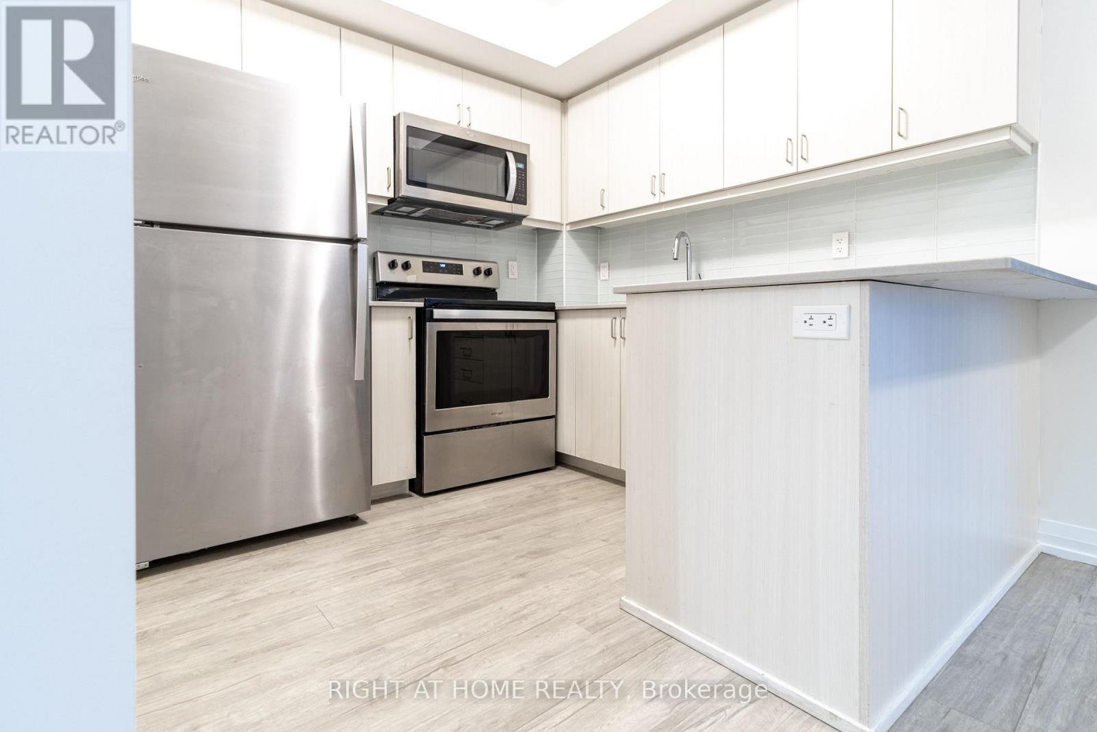 414 - 55 Smooth Rose Court, Toronto, Ontario  M2J 0G7 - Photo 5 - C12559856