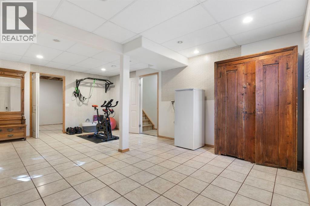 179 Quigley Drive, Cochrane, Alberta  T4C 1R4 - Photo 31 - A2269180