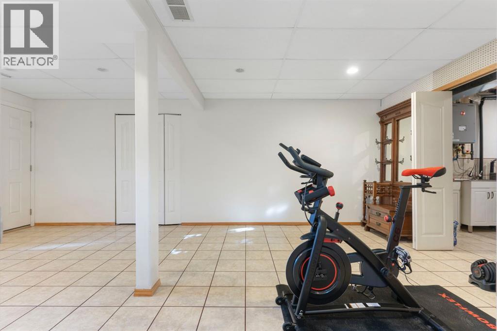 179 Quigley Drive, Cochrane, Alberta  T4C 1R4 - Photo 29 - A2269180