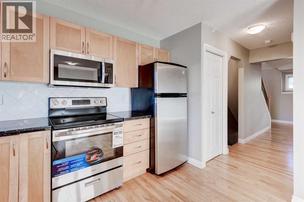 66 Cedarwood Lane Sw, Calgary, Alberta  T2W 6J3 - Photo 8 - A2265127