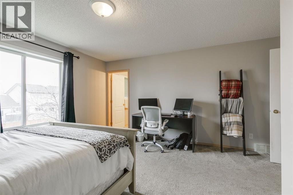 228 Woodhaven Drive, Okotoks, Alberta  T1S 1S7 - Photo 25 - A2270533