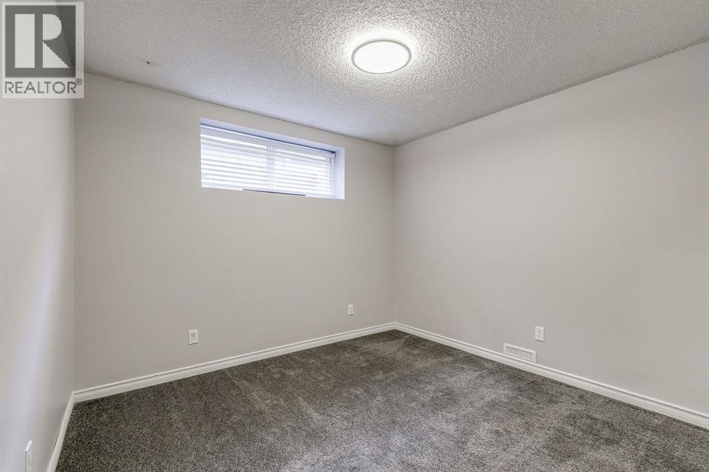 228 Woodhaven Drive, Okotoks, Alberta  T1S 1S7 - Photo 29 - A2270533