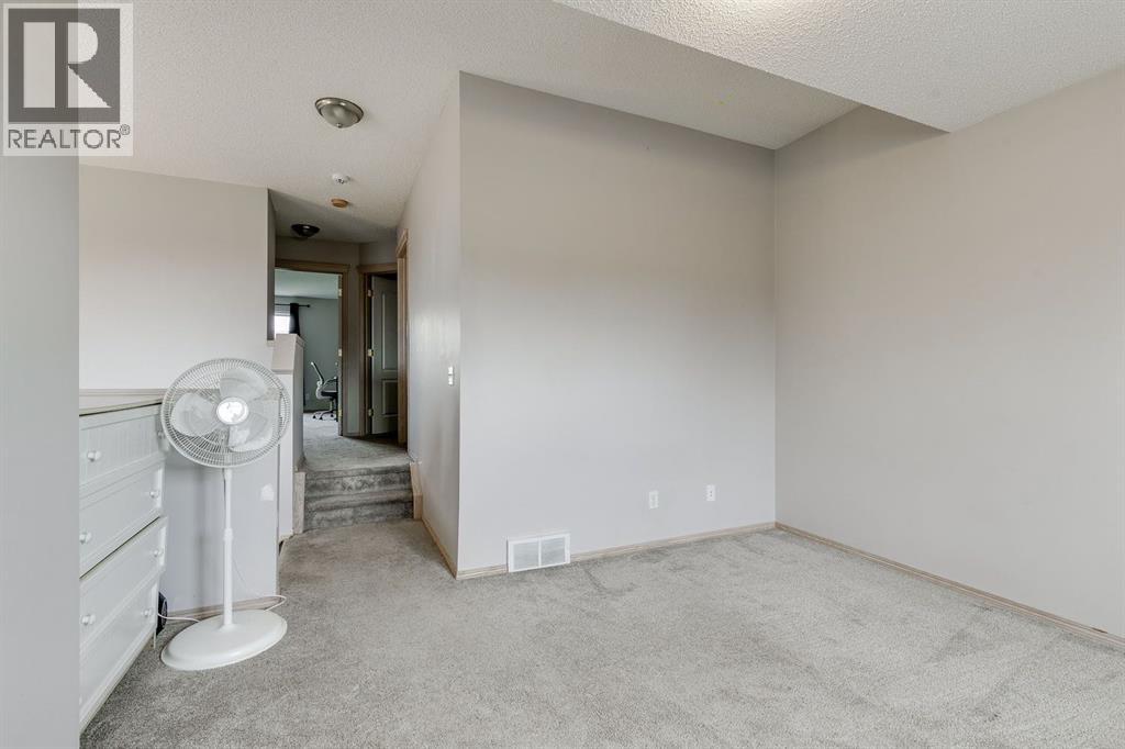 228 Woodhaven Drive, Okotoks, Alberta  T1S 1S7 - Photo 18 - A2270533