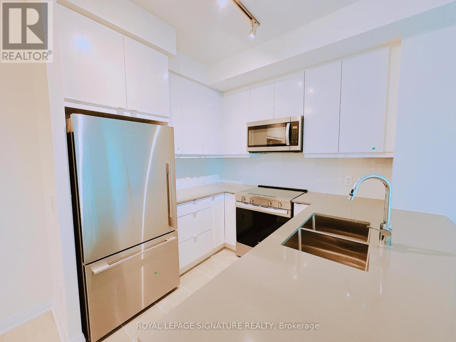 310 - 3260 Sheppard Avenue E, Toronto, Ontario  M1T 3K3 - Photo 6 - E12560402