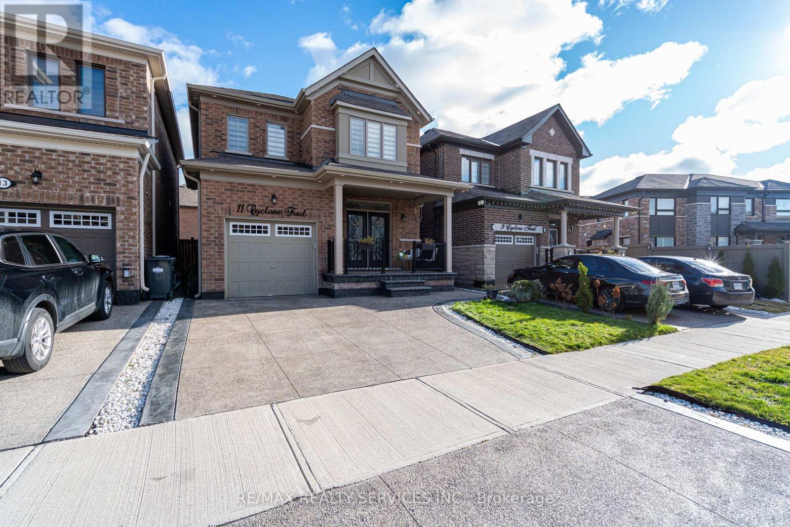 11 Cyclone Trail, Brampton, Ontario  L7A 5E8 - Photo 2 - W12560428