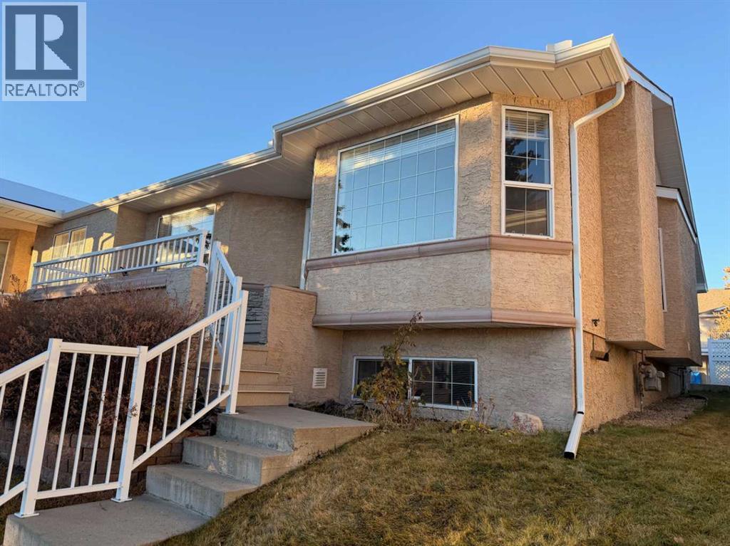 138 Sierra Morena Green Sw, Calgary, Alberta  T3H 3E4 - Photo 1 - A2268938