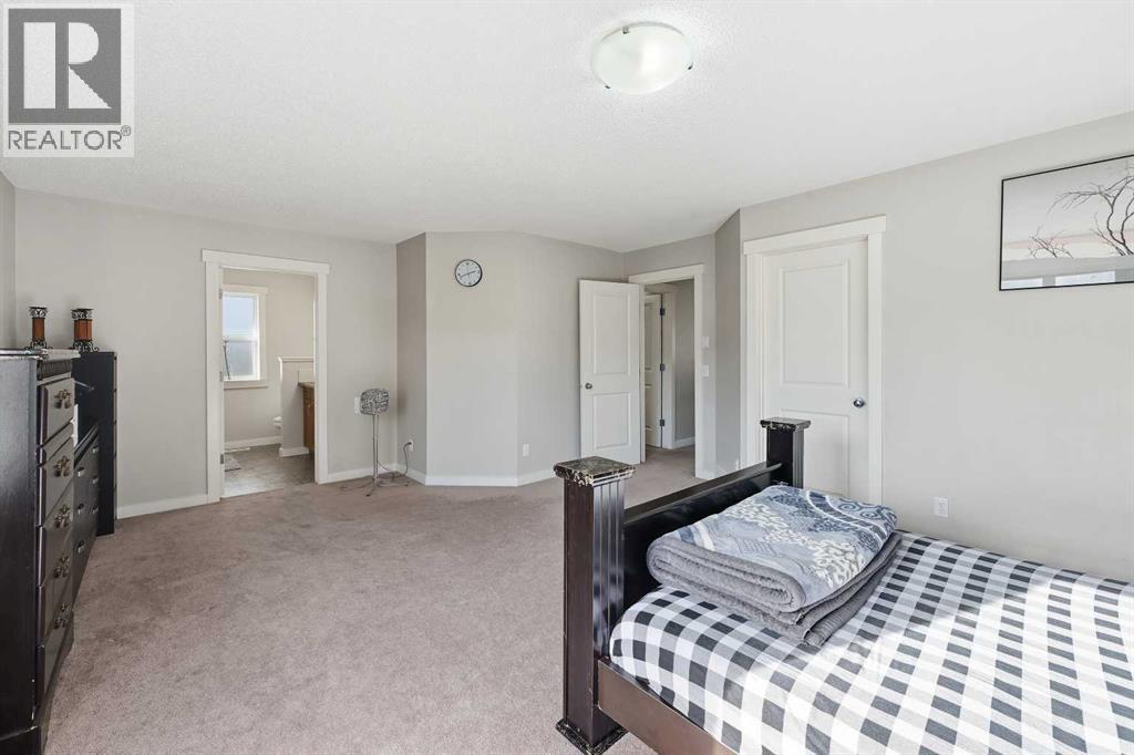 217 Coopers Grove Sw, Airdrie, Alberta  T2B 0G4 - Photo 22 - A2267001