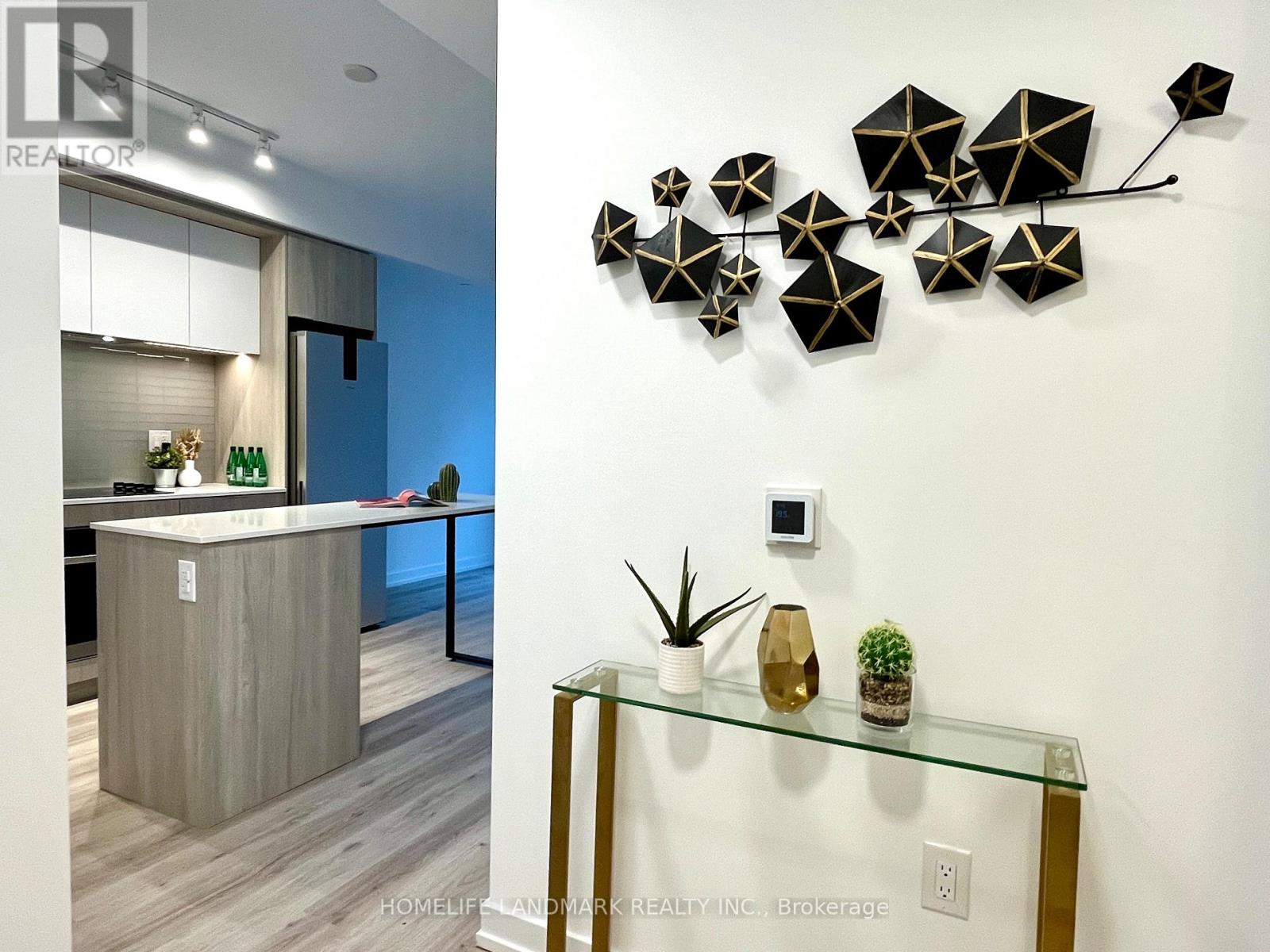 709 - 395 Square One Drive, Mississauga, Ontario  L5B 0P6 - Photo 2 - W12560776