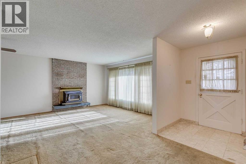 916 Mapledale Place Se, Calgary, Alberta  T2J 1W6 - Photo 3 - A2270331