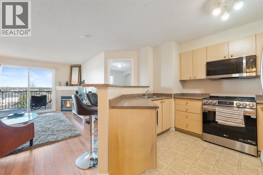 1406, 12 Cimarron Common, Okotoks, Alberta  T1S 1B1 - Photo 5 - A2270554