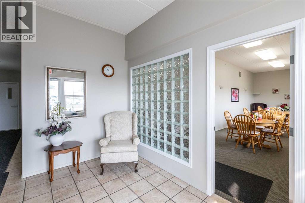 205, 4319 49 Street, Innisfail, Alberta  T4G 1B6 - Photo 3 - A2255239