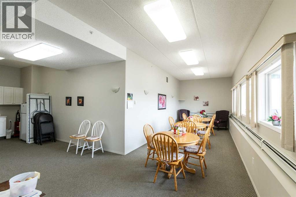 205, 4319 49 Street, Innisfail, Alberta  T4G 1B6 - Photo 4 - A2255239