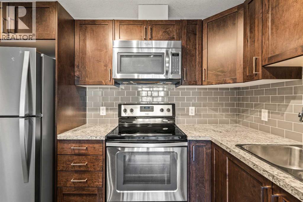 156 Evanscrest Gardens Nw, Calgary, Alberta  T3P 0S1 - Photo 9 - A2271092