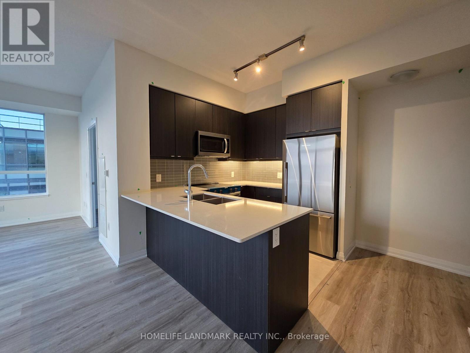 1102 - 3260 Sheppard Avenue E, Toronto, Ontario  M1T 3K3 - Photo 2 - E12560984