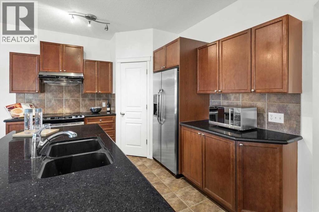 110 Cougar Ridge Circle Sw, Calgary, Alberta  T3H 5R7 - Photo 6 - A2263540
