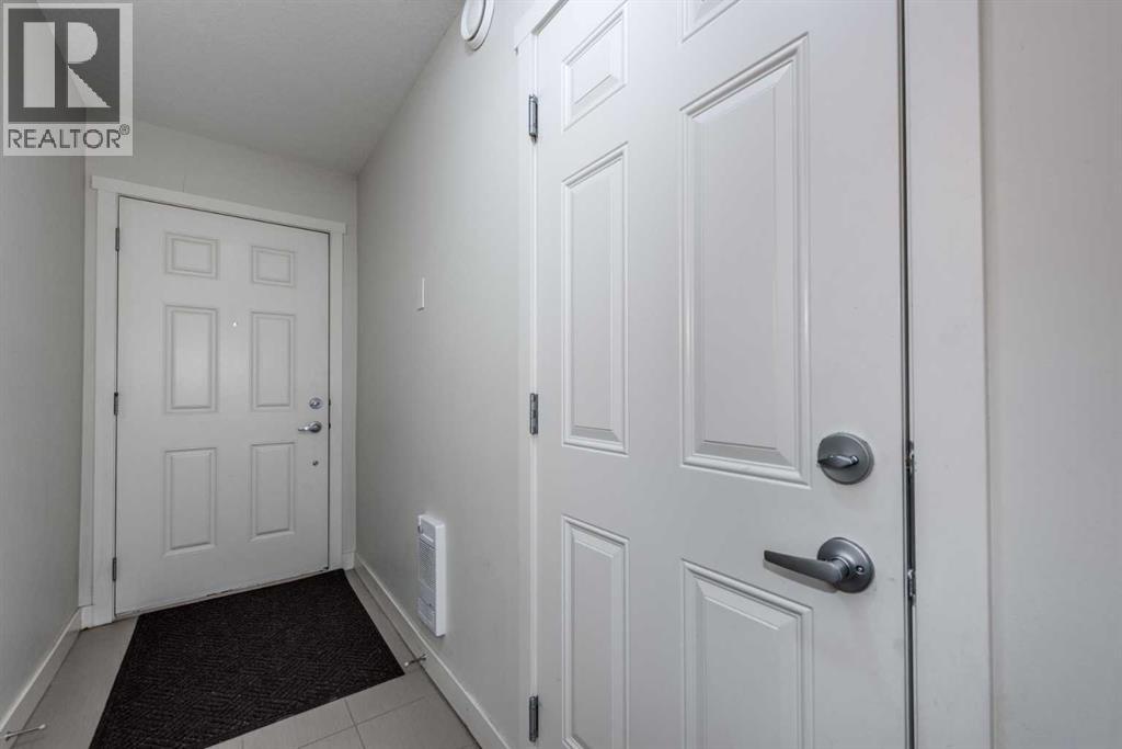 408 Nolanfield Villas Nw, Calgary, Alberta  T3R 0T9 - Photo 6 - A2271626