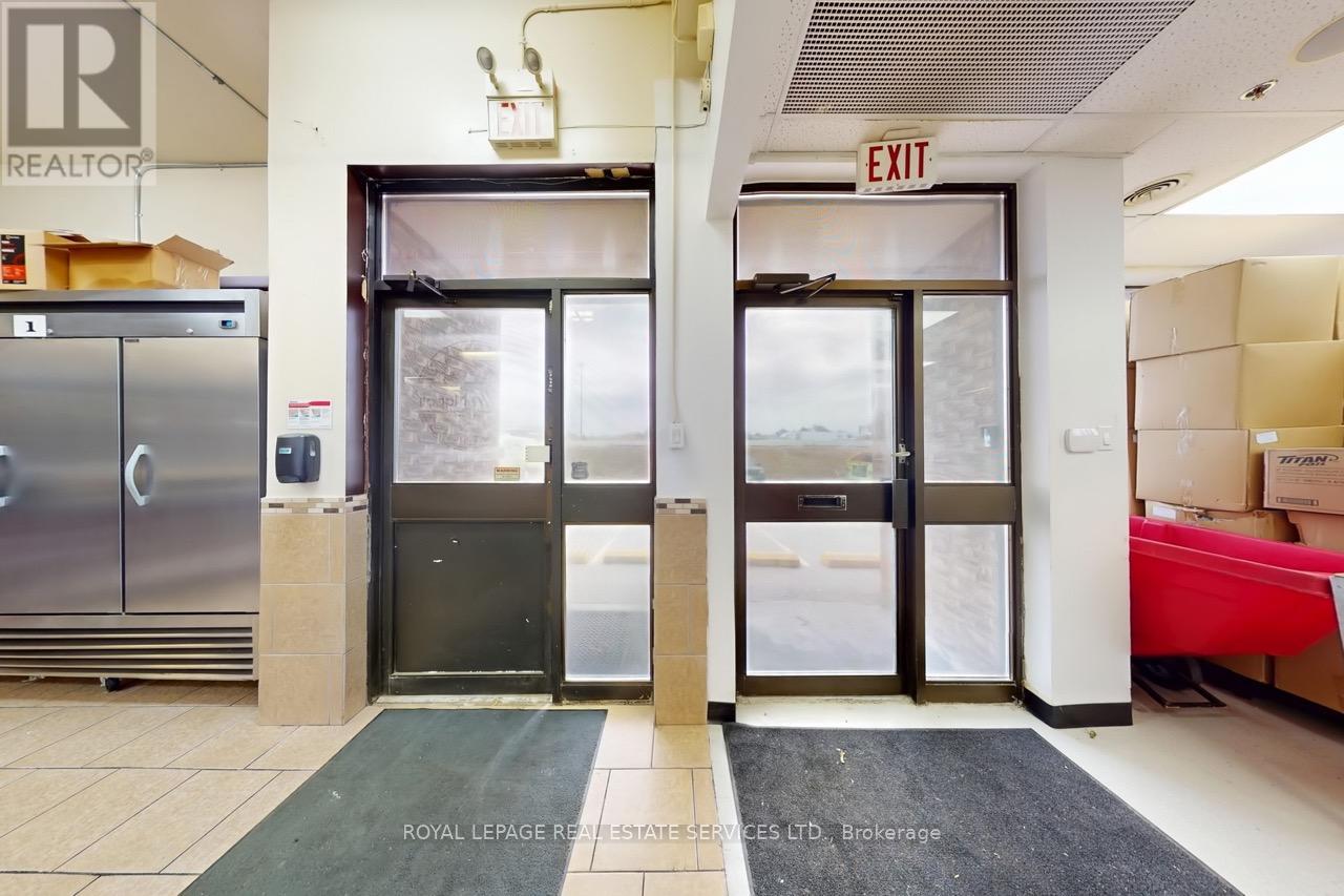 557 Dixon Road, Toronto, Ontario  M9W 1A8 - Photo 4 - W12561092