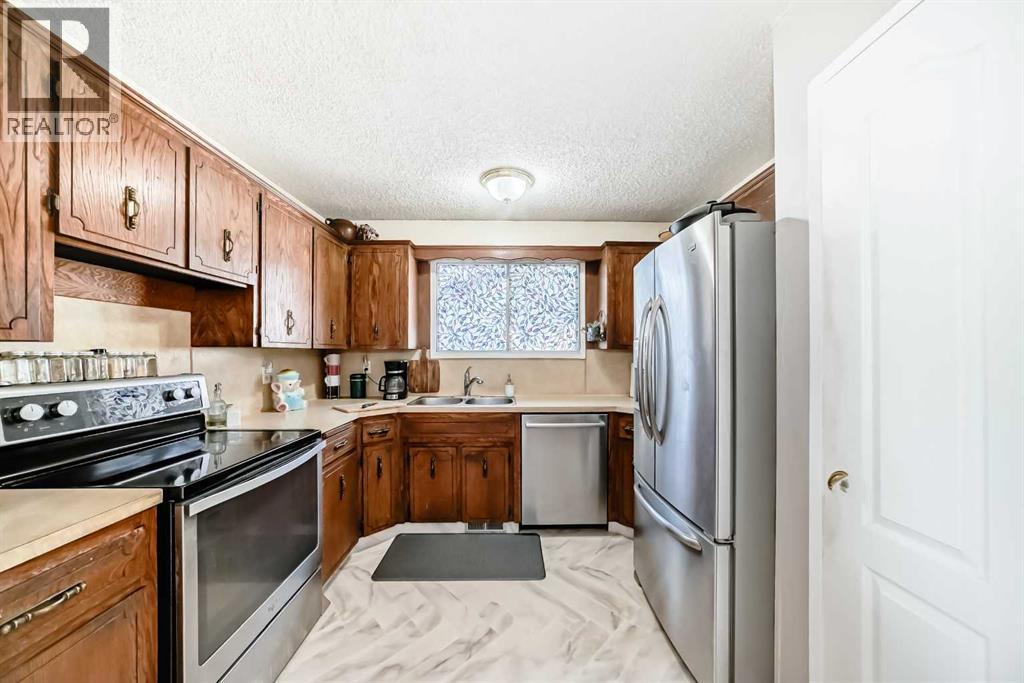 244 Flett Drive Ne, Airdrie, Alberta  T4B 1N5 - Photo 13 - A2256580