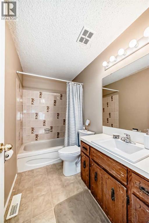 244 Flett Drive Ne, Airdrie, Alberta  T4B 1N5 - Photo 30 - A2256580